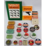 A collection of air pistol books, pellet boxes and targets. Books included The Collector’s Guide