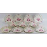 A group of Minton porcelain dinner plates and comports. Comprising nine plates, four comports and