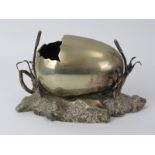 A late Victorian silver plated egg shell spoon warmer. 17 cm length. Condition report: Some age