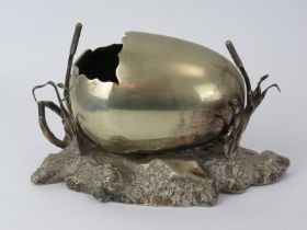 A late Victorian silver plated egg shell spoon warmer. 17 cm length. Condition report: Some age