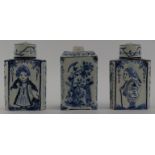 Three Dutch Delft tea caddies, 18th/19th century. Comprising a pair of tea caddies with covers