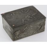 A rare Arts & Crafts pewter trinket box, early 20th century. Decorated in repoussé with a dragon and