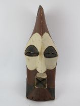 Tribal Art: An African carved and painted wood mask, Songye people, Congo. 52 cm height. Condition