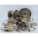 A large group of silver plated wares. Notable items included serving trays, an entree dish, a jug,