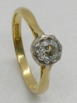 An old mine cut diamond single stone ring, illusion set in 18ct white and yellow gold, hallmarked