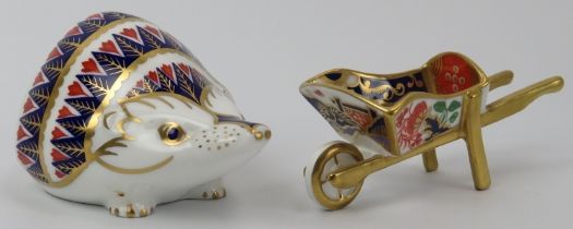A Royal Crown Derby hedgehog paperweight and a model of a wheelbarrow. (2 items) 11.5 cm length,