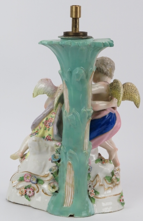 A Meissen style porcelain table lamp base, 19th century. Modelled with two cherubs holding a - Image 2 of 3