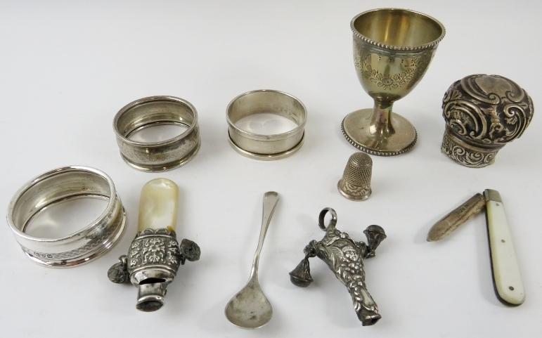 Mixed silver items including napkin rings, egg cup baby rattles thimble, fruit knife and perfume - Image 3 of 3
