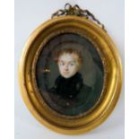 A brass framed miniature watercolour of a military gentleman unsigned. 5cm x 4cm . Condition report: