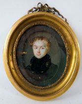 A brass framed miniature watercolour of a military gentleman unsigned. 5cm x 4cm . Condition report: