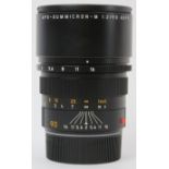 A Leica APO-Summicron-M 1:2 90mm ASPH camera lens. Leica case and additional lens cap (E39)