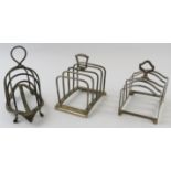 Three four slice silver toast racks including one by Hukin & Heath. All fully hallmarked. Gross