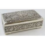 A highly ornate Indonesian silver presentation box with internal inscription. Marked UD 800 to base.