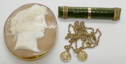 A shell cameo brooch caved to depict a Classical lady in profile in yellow precious metal mount