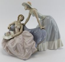 A large Lladro porcelain figural group entitled ‘Debutantes’. Model number: 5486. 21.5 cm height.