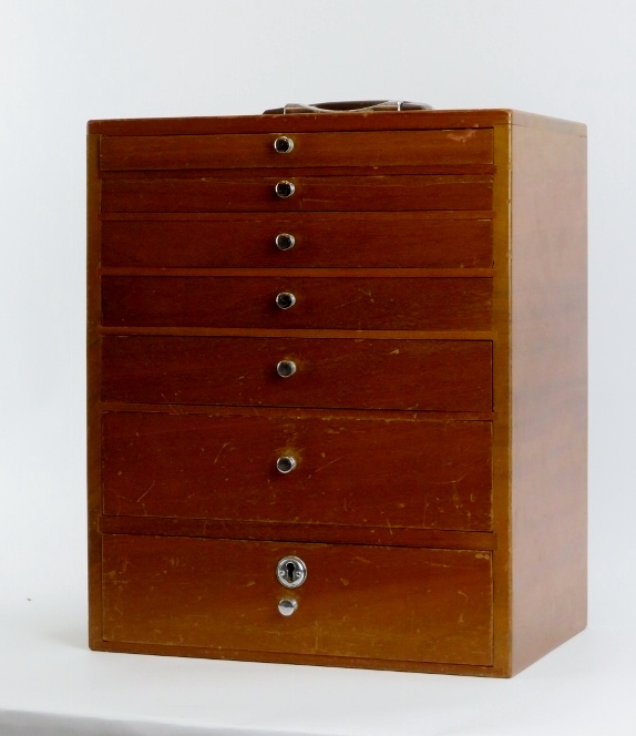 A vintage dentist’s walnut cabinet. With seven graduated draws, the top four compartmented. 41 cm - Image 2 of 3