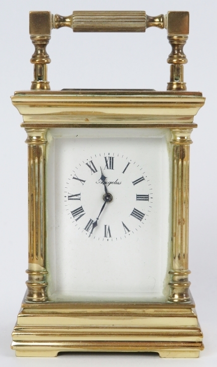 A French Angelus eleven jewels brass carriage clock. Key included. 9 cm height. Condition report: - Image 2 of 6