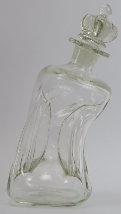 A Jacob Bang for Holmegaard tipsy ‘Kluk Kluk’ pinched clear glass decanter, mid 20th century. 23.5