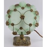 A vintage gilt metal and green glass lotus pad table lamp, early/mid 20th century. Decorated with