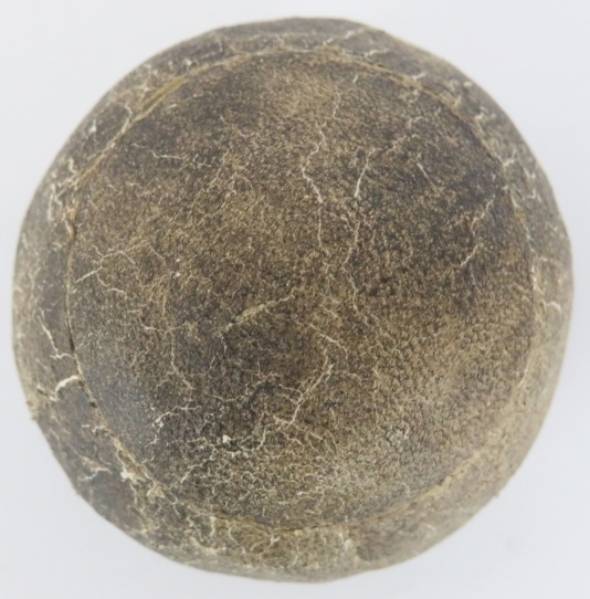 An antique feather golf ball, 19th century. Stitched leather exterior. 4.6 cm diameter. Condition - Image 3 of 3