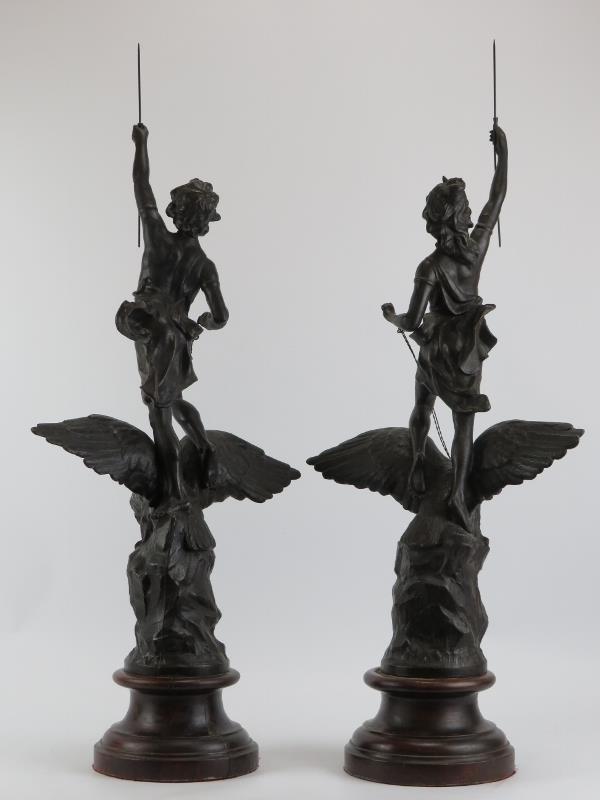 A large pair of bronzed spelter figures, 20th century. Modelled depicting a male and female - Image 2 of 2