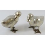 Pair of hollow silver duckling figures, limited edition 106/300, indistinctly signed. Marked 925