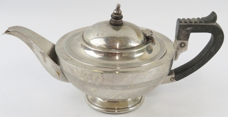 A silver Art Deco teapot with ebony handle and finial. Hallmarked for Chester 1919, maker Barker - Image 2 of 3