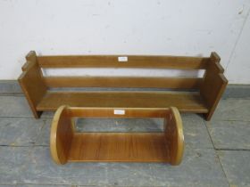 An Art Deco Period light oak tabletop bookshelf with stepped side supports. Together with an Art