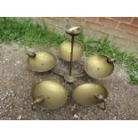 A large vintage Art Deco style brass pendant light fitting, having five branches with adjustable