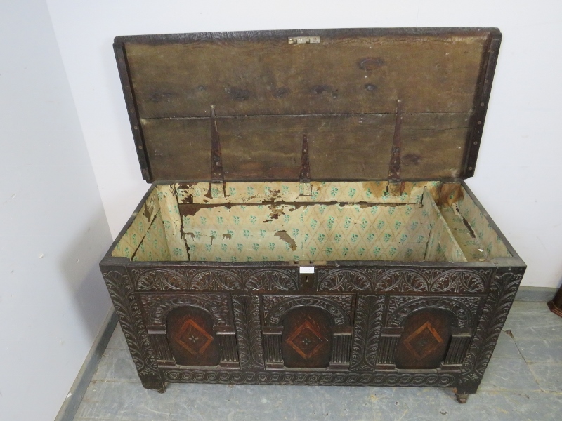 A late 17/early 18th century oak panelled coffer, having internal candle box, the front profusely - Image 3 of 3