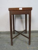 An Arts & Crafts Period oak plant stand, the galleried top with reeded edge, on inner chamfered