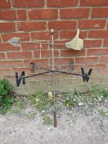 A vintage brass and steel weathervane in the form of a thumbs up with an arrowhead. H74cm W56cm