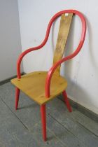 A contemporary artisan made Windsor chair, having a burr oak central splat above a light ash