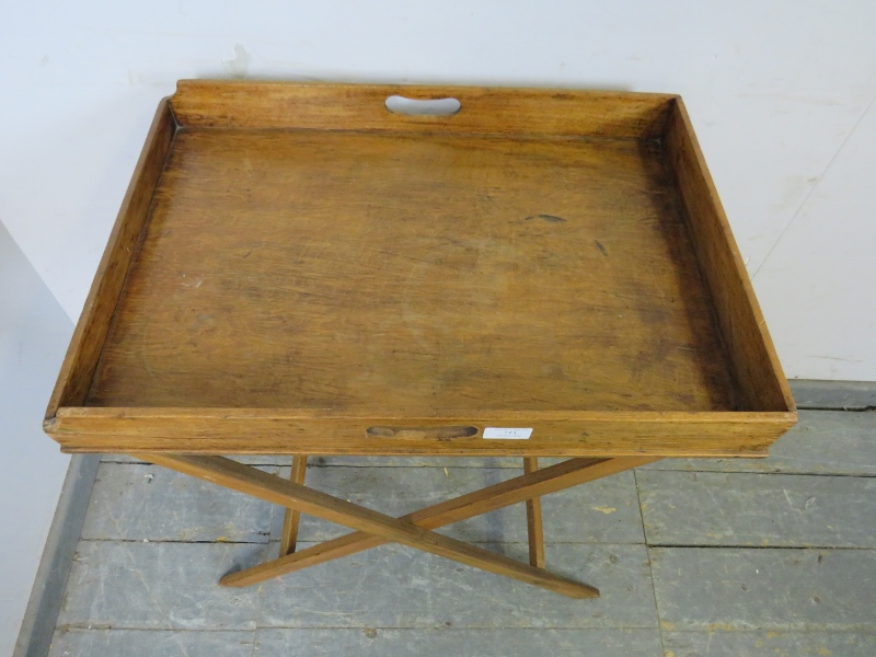 An early 20th century walnut butler’s tray on stand, the galleried tray with pierced handles to - Bild 3 aus 3