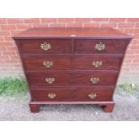 A Georgian mahogany chest of good colour, housing two short above three long graduated cock-beaded