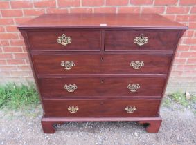 A Georgian mahogany chest of good colour, housing two short above three long graduated cock-beaded