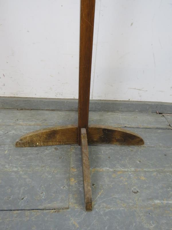 An Art Deco Period mahogany coat stand, having a selection of 10 turned peg hooks, the square column - Image 3 of 3