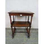 A fine quality 19th century rosewood two-tier whatnot in the manner of Gillows, the top with