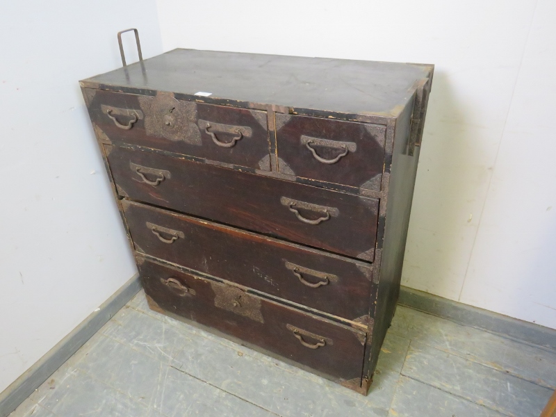 An antique Japanese Meiji Period ebonised metal bound tansu chest, housing two short above three - Image 2 of 2