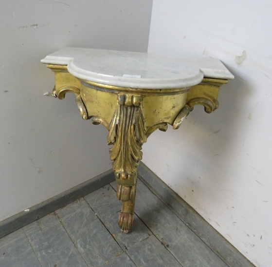 A 19th century French giltwood console table, the shaped white marble loose top on a giltwood base