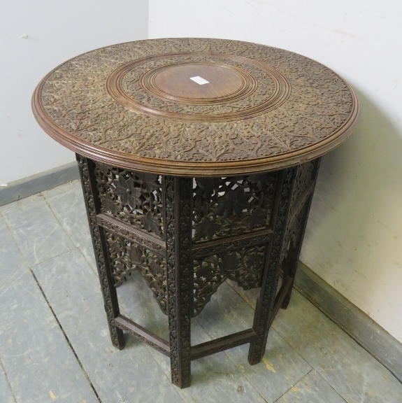 An early 20th century Angle Indian hardwood occasional table, the circular top with relief carving - Image 2 of 2