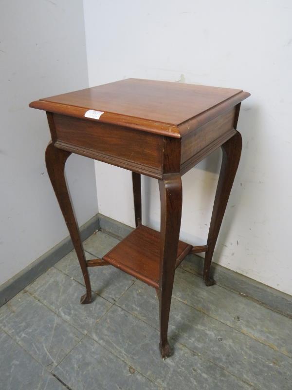 An antique mahogany square lamp table, on cabriole supports united by a braced undertier. H74cm - Image 2 of 2