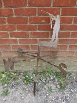 A vintage steel weathervane in the form of a hunter with shotgun. H85cm W61cm D63cm (approx).
