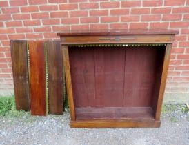 A 19th century walnut gilt metal mounted open bookcase, housing three height adjustable