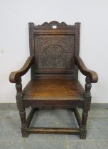 A 19th century oak Wainscott chair in the 17th century taste, the backrest profusely carved with