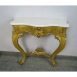 A vintage French giltwood console table, the white marble serpentine top on an ornate giltwood