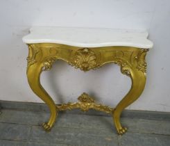 A vintage French giltwood console table, the white marble serpentine top on an ornate giltwood