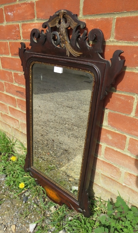 A Georgian mahogany parcel gilt bevelled wall mirror, the shaped and pierced surround with a - Image 2 of 3