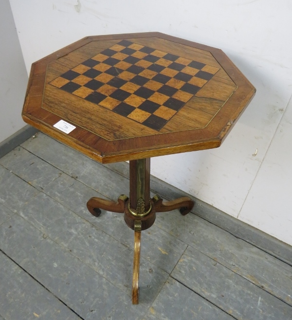 A 19th century rosewood octagonal games table, having inlaid ebony and burr walnut chessboard top,