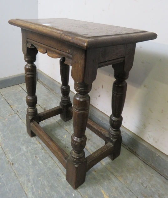An antique oak joint stool in the 17th century taste with shaped frieze, on turned supports with - Image 2 of 3